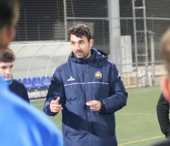 Soccer academy psychologist at training session